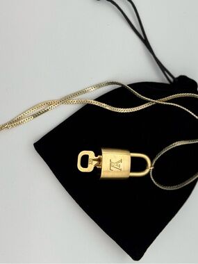 Louis Vuitton Gold tone LV Padlock #320 necklace 18k gp chain Statement Piece